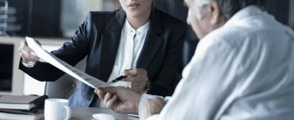 Bankruptcy lawyer speaking with client